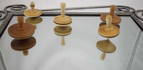 Spinning tops turned from Douglas Maple and fruit wood