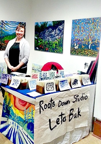 Craft Show - Grand Forks artist Leta Bak with her paintings