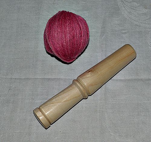 Ball Winder Finished with a sample ball of yarn made on it.
