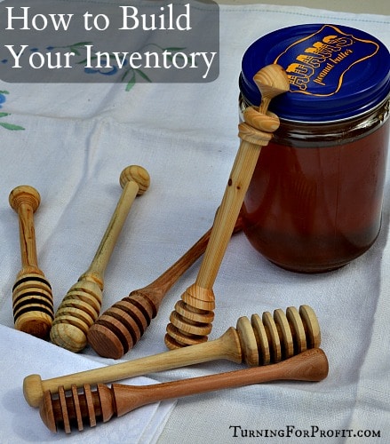 honey dippers and a jar of honey
