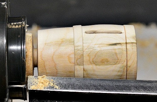 Coin Bank Part bottom off of lathe