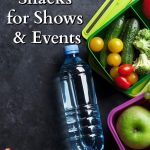 A water bottle and fresh fruit and vegetables