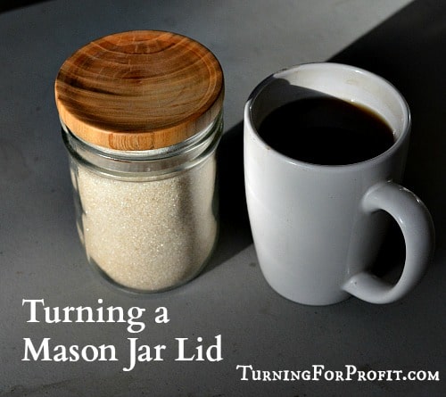 Jar Lid - A cup of coffee and a lid on the sugar jar.