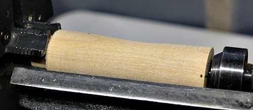 wooden handle mount the wood on the lathe