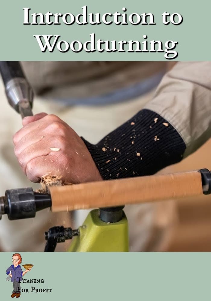 Hands working wood on a lathe