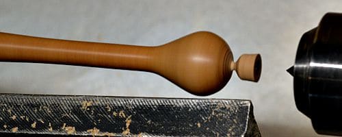 The parting tool is only needed once when the turning is held in a multi-jawed chuck